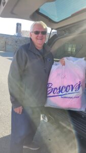 Charlie Polinko fills his car as well!