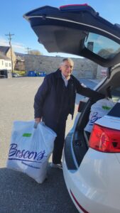 Ralph Nevel fills his car quickly.